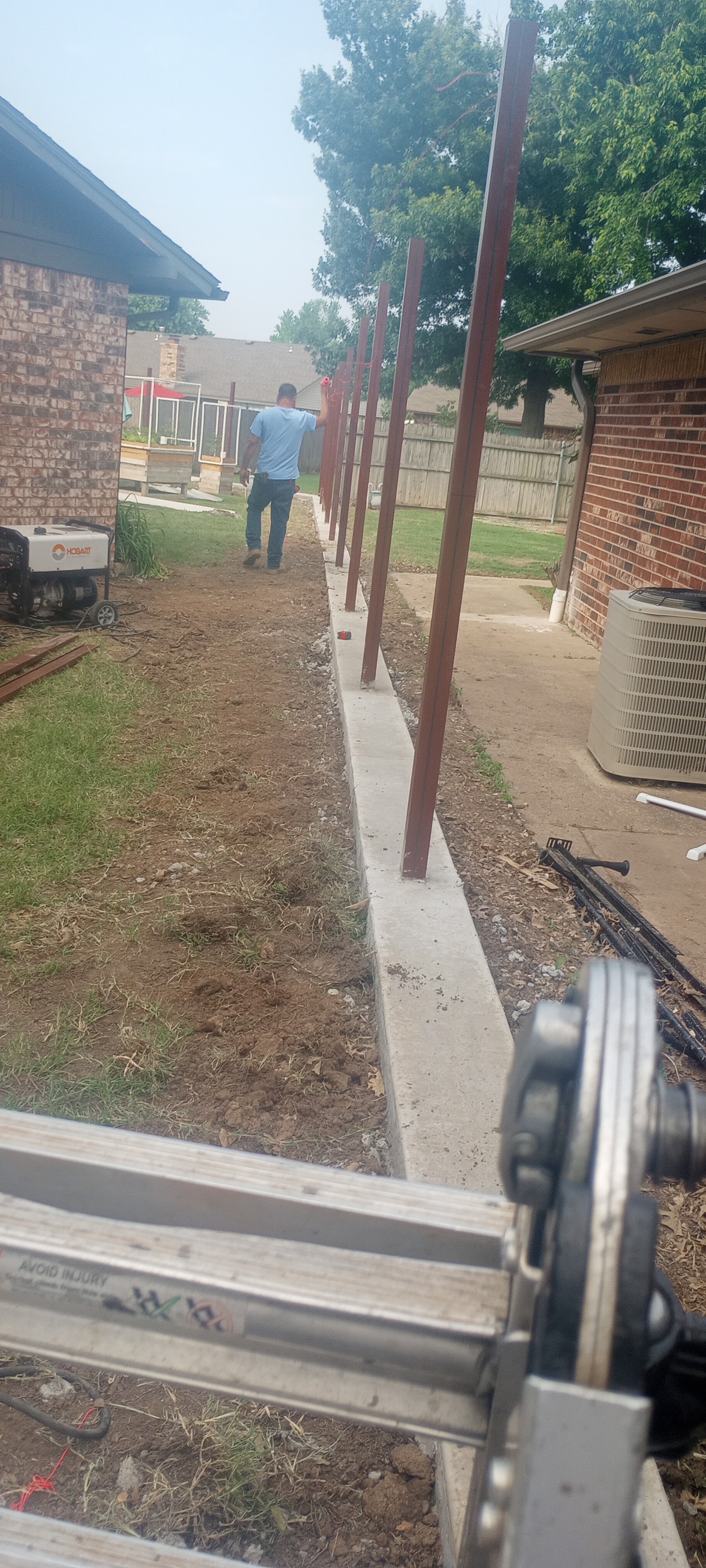 Metal fence by Forever Carports